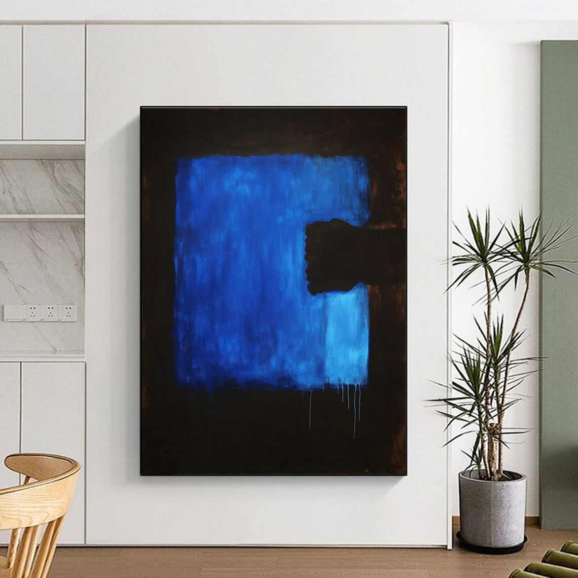 Large abstract painting featuring a dark blue background and a blue foreground, creating a striking visual depth and emotional resonance.STSC1313