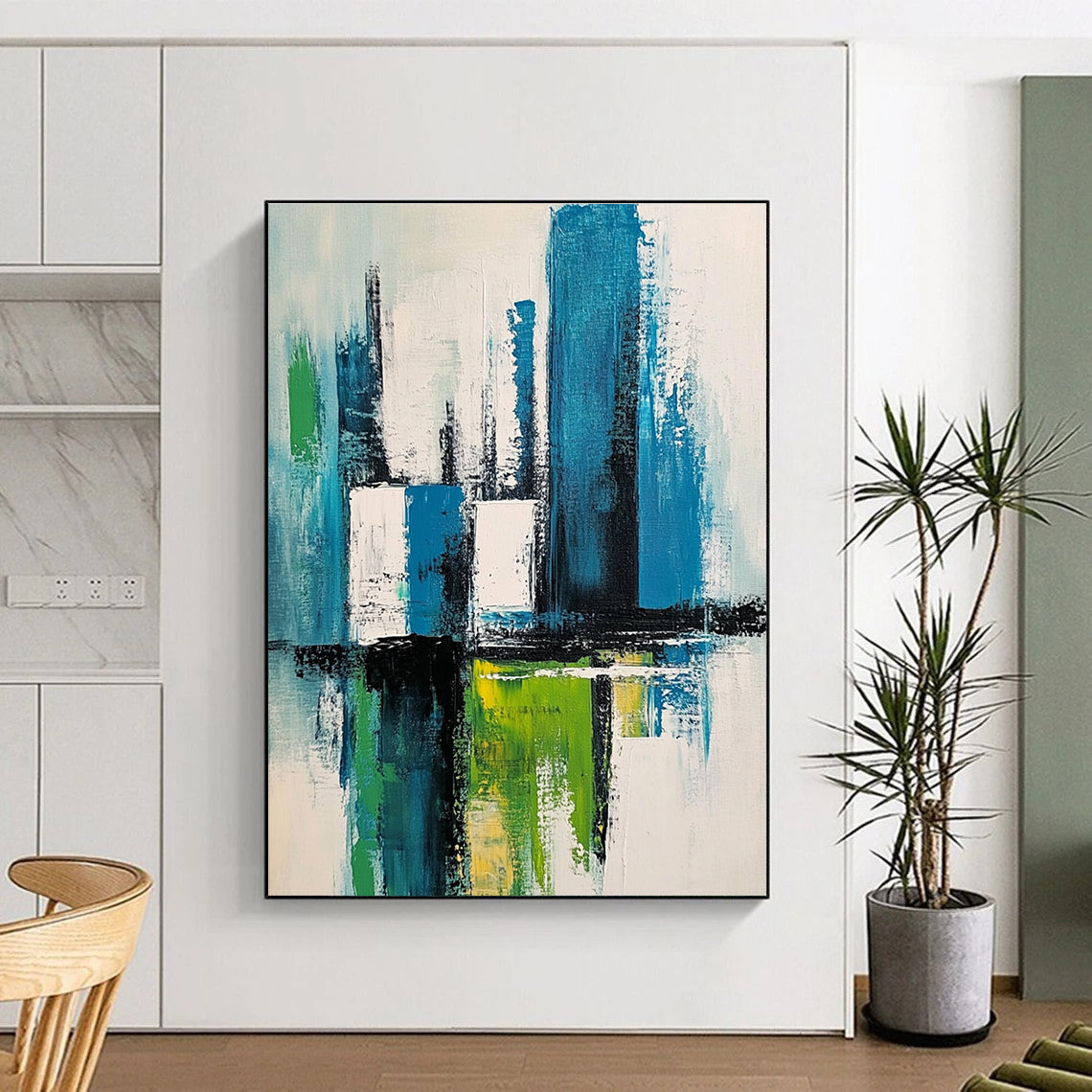 Large abstract painting of a cityscape in blue green and white with thick expressive brush strokes and a minimalistic style.STSC281