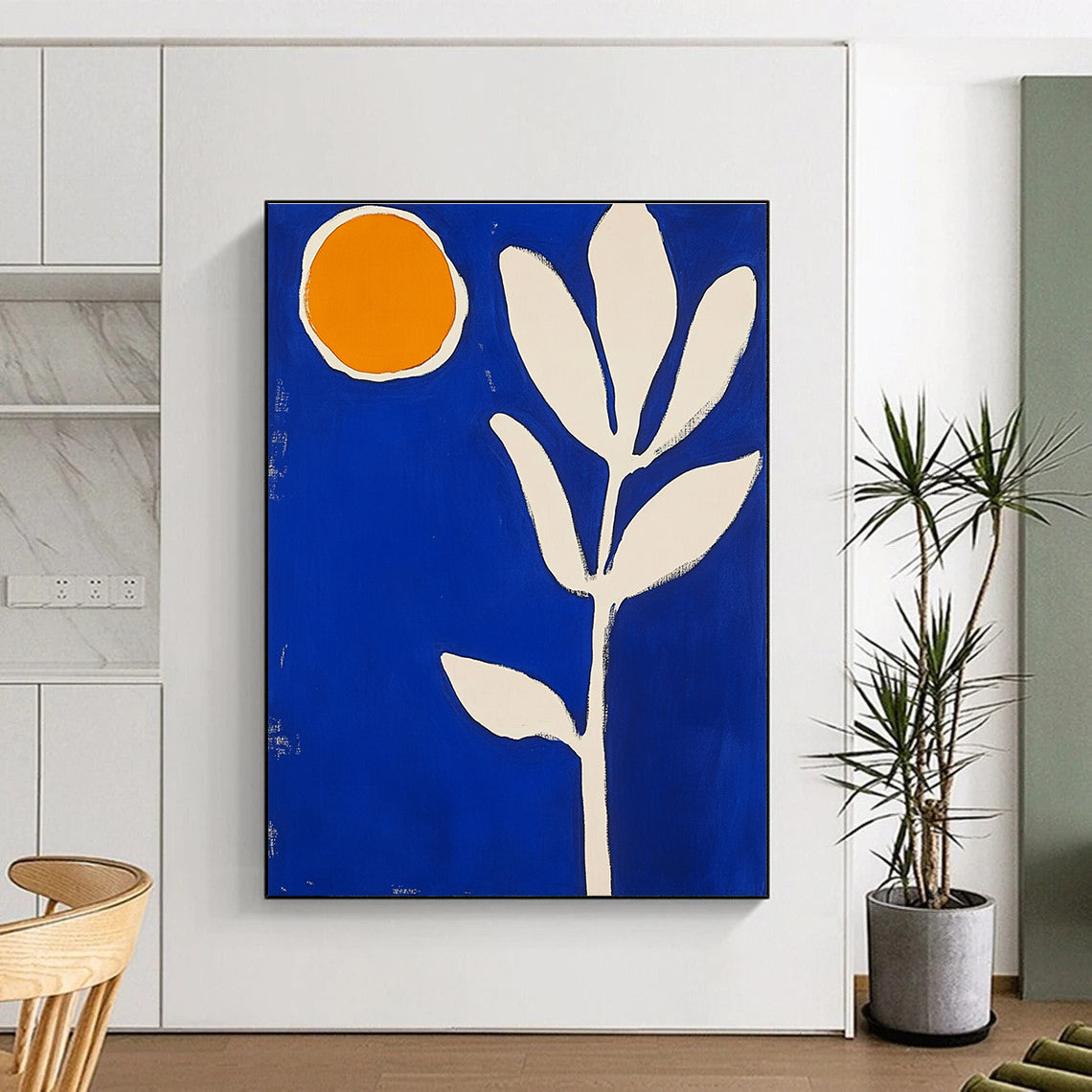 Large abstract painting featuring blue and white shapes an orange sun and a thick brush stroke flower in vibrant colors.STSC1316