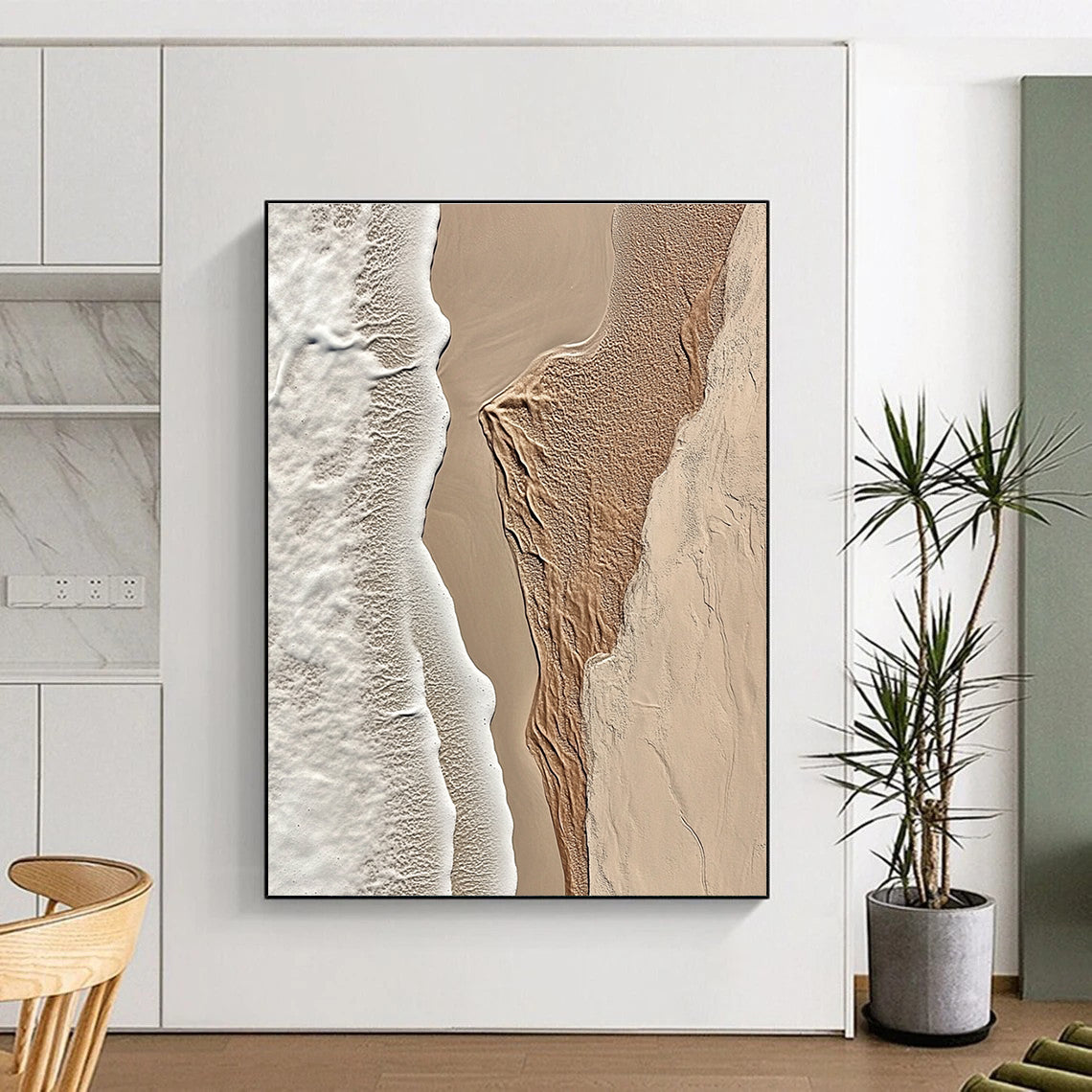 A large abstract painting featuring intricate textures of beige sand and white waves capturing the tranquility of coastal landscapes.STSC1294