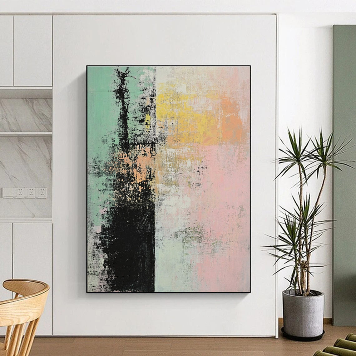 Large abstract painting featuring soft pink green and yellow hues with textured layers creating a serene tree motif against a tranquil background.STSC796