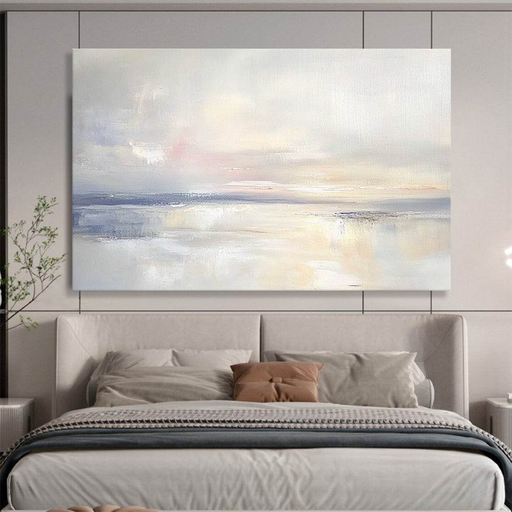 A large abstract painting featuring an open sky and gentle clouds in muted pastels, blending into serene waters for a tranquil ambiance.SC556
