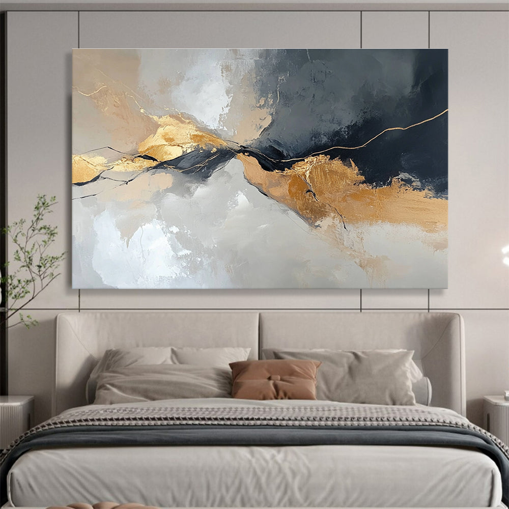 Large abstract painting with an aerial view in gray and beige colors featuring minimalistic shapes and brush strokes enhanced with gold accents.SC104