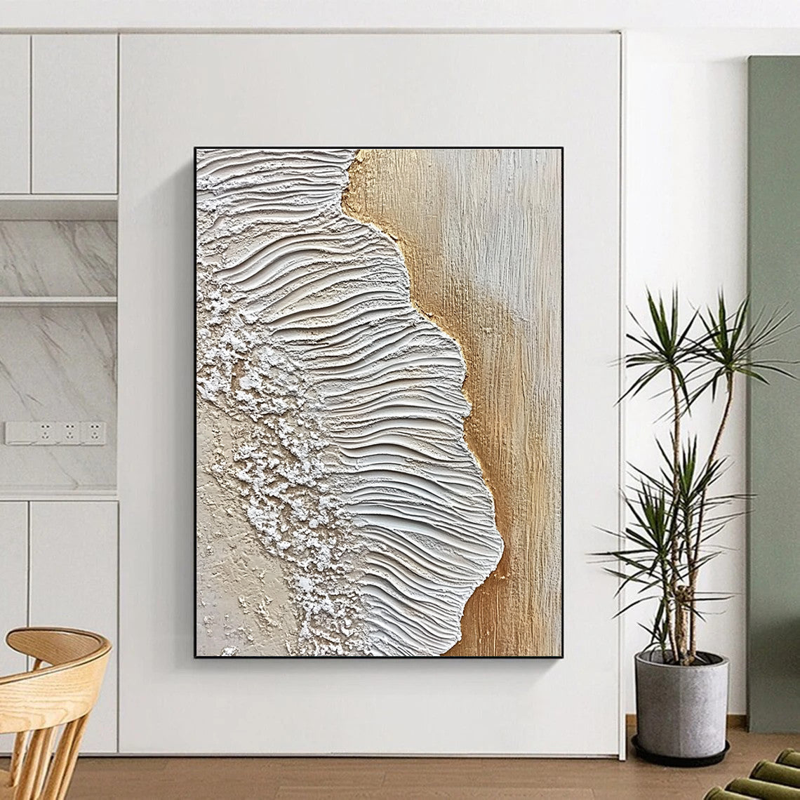 A large abstract painting featuring textured sand and waves in white and beige against an oak wood floor, embodying coastal elegance.STSC946