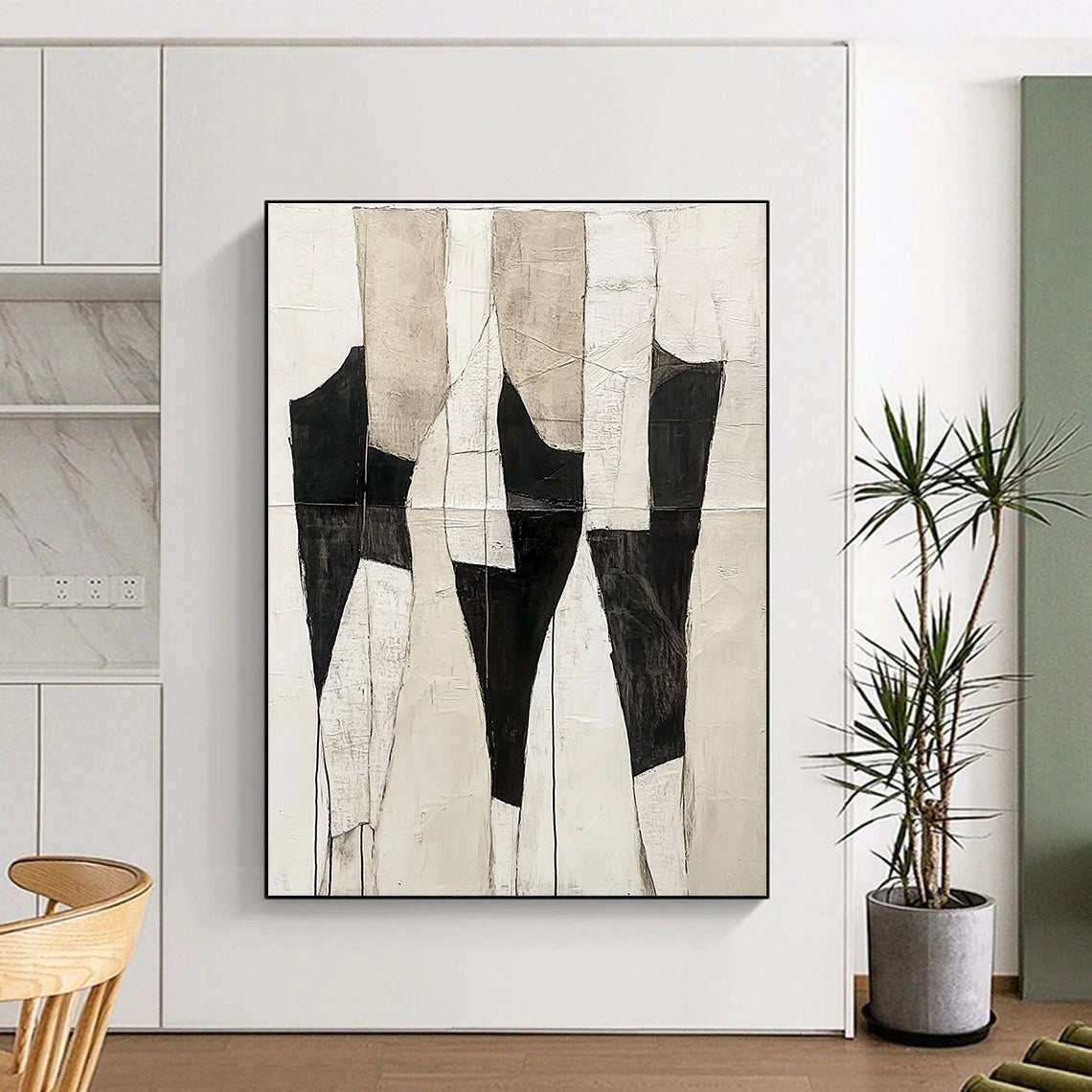 Large abstract painting featuring a light white and black color scheme with ivory cream background and textured body shapes in dark gray and white.STSC403