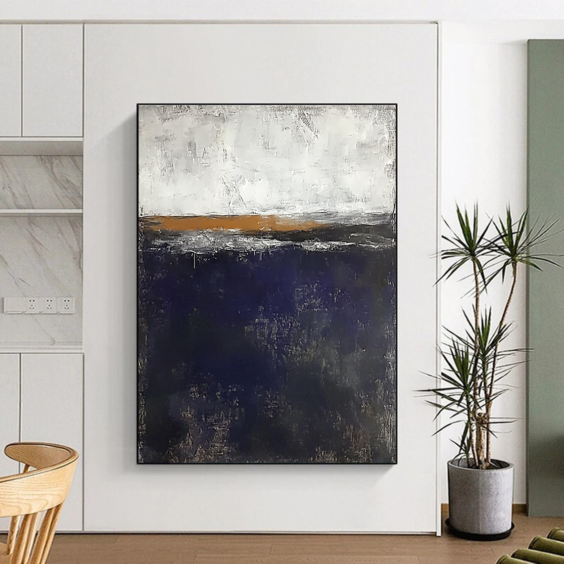 Large abstract painting of the sea in dark blue and gray with white highlights and small brown elements against a flat gray background.STSC706