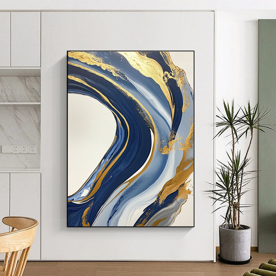 Large abstract blue and gold painting featuring marbling on a white background with swirling gold lines and fluid shapes creating luxurious textures.STSC032
