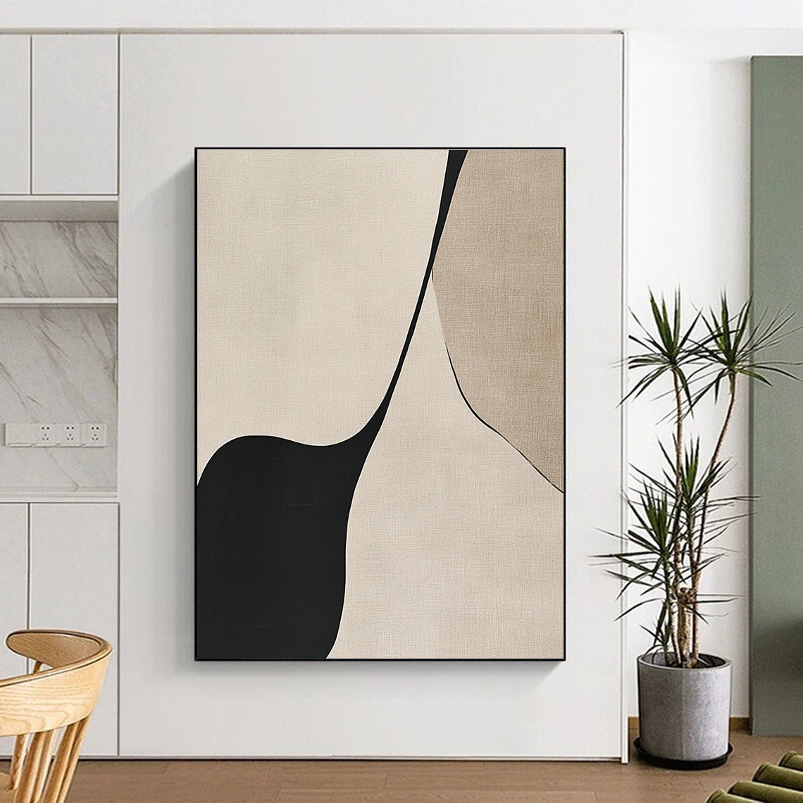 Bold abstract art featuring black lines on a beige background showcasing the elegant simplicity of the female form through simple shapes and curves.STSC1324