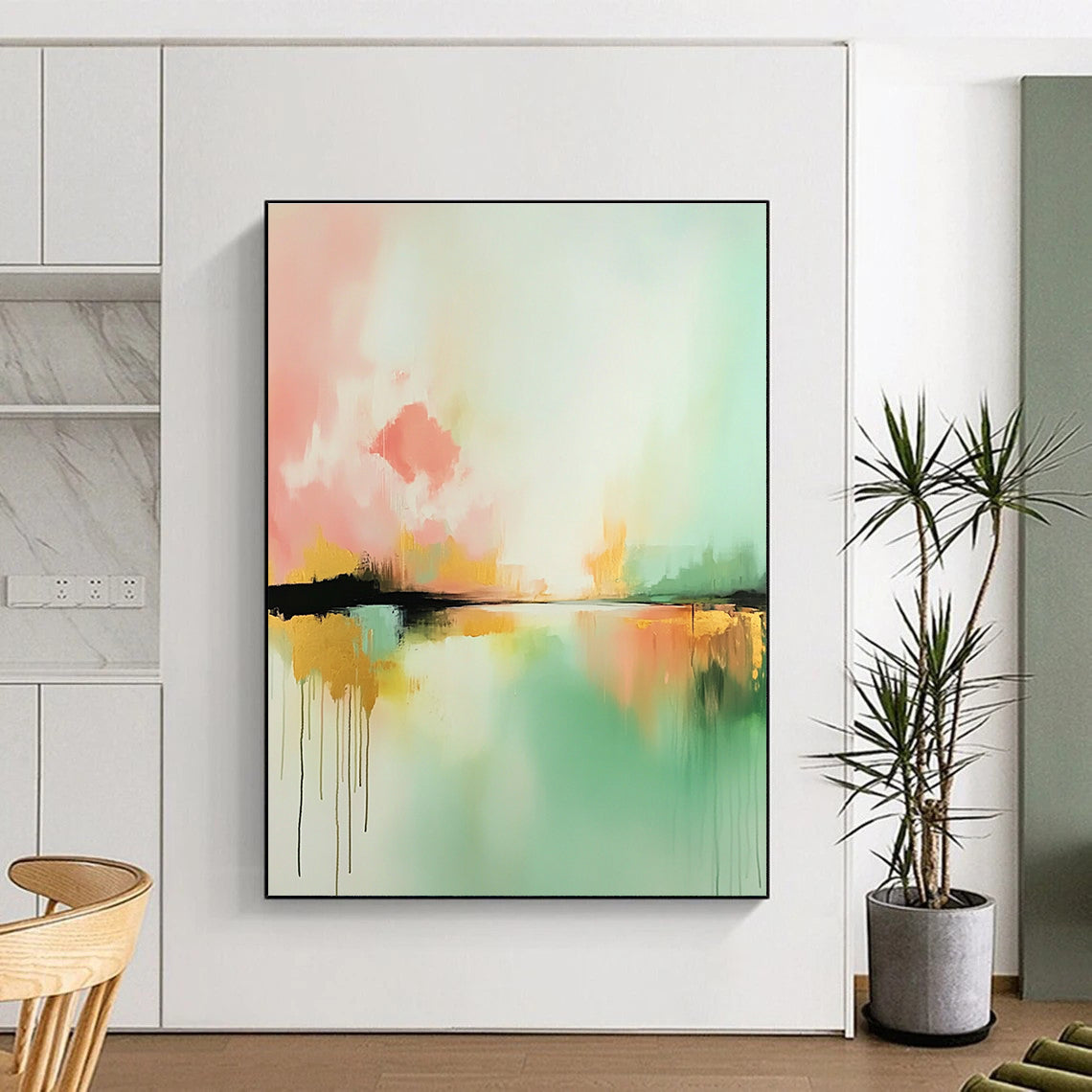 Large abstract painting inspired by Claude Monet featuring light pink mint green and gold hues with expressive brush strokes and a serene water foreground.STSC086