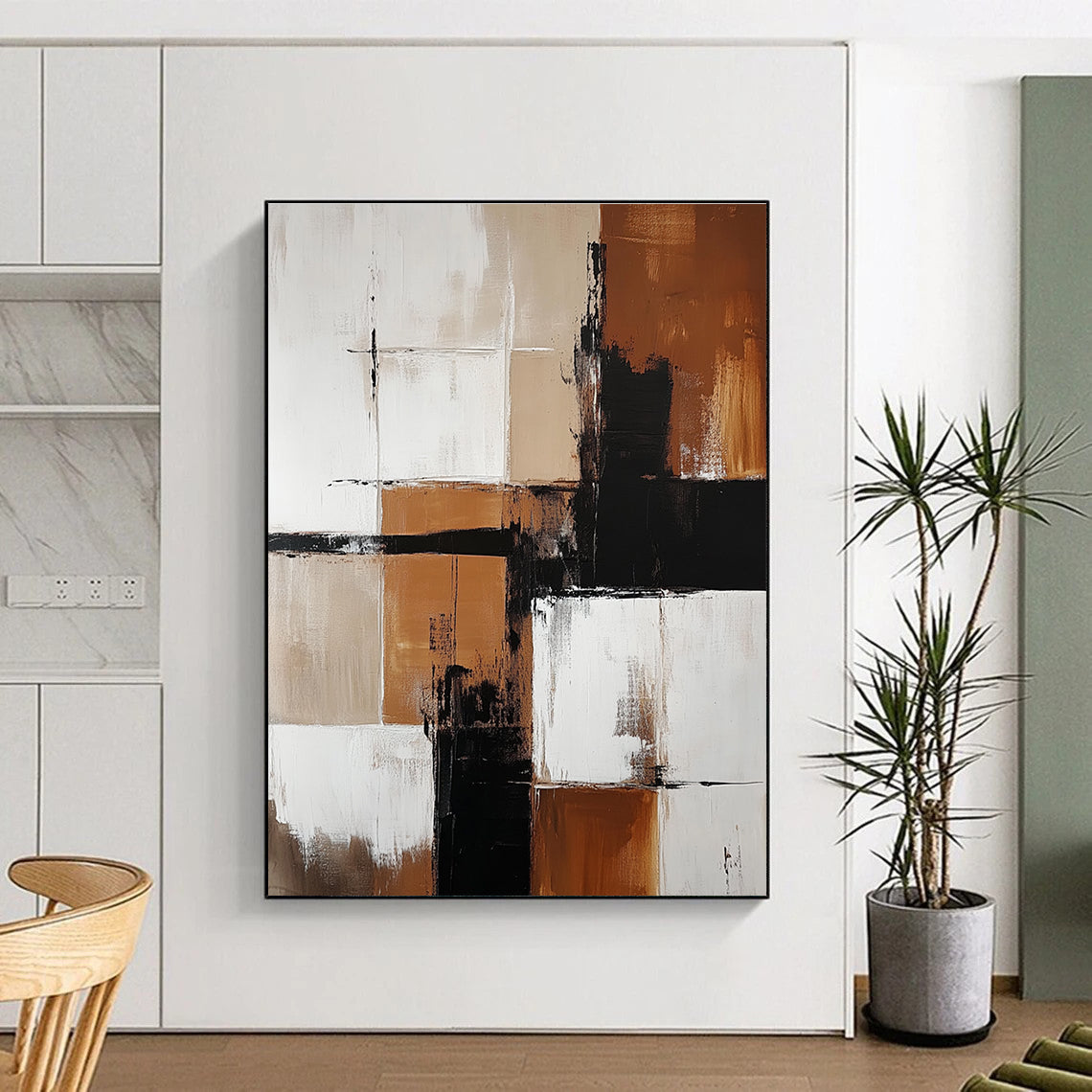 Abstract painting featuring brown and white color blocks with minimalistic black shapes enhancing each section creating a striking visual impact.STSC415