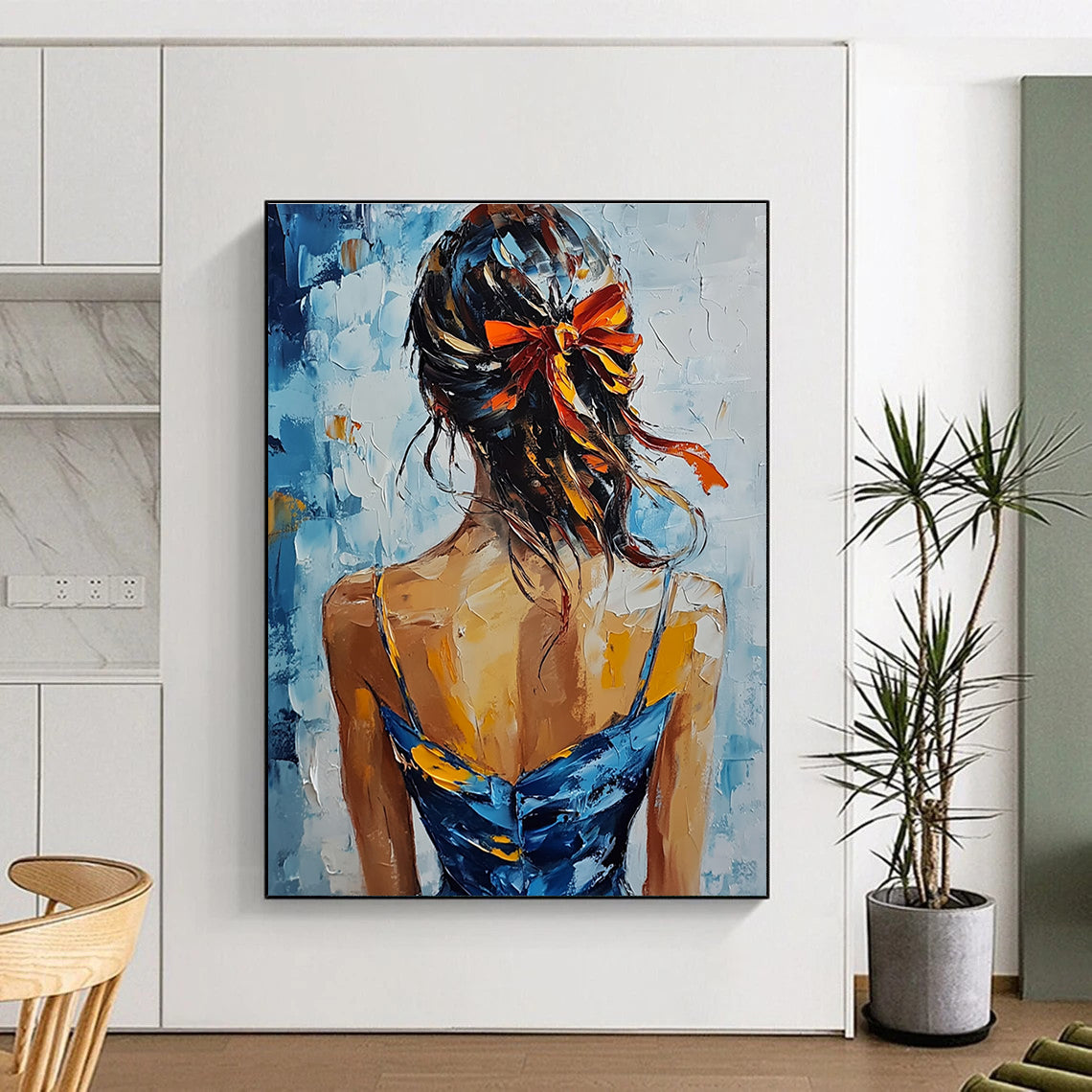 A large abstract painting featuring an elegant woman in a blue and yellow dress with red ribbons against a soft blue and white background.STSC879