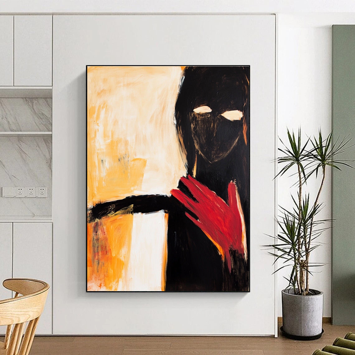 Large abstract painting of an elegant woman in black and white with a striking red hand and warm shades of yellow and orange.STSC640