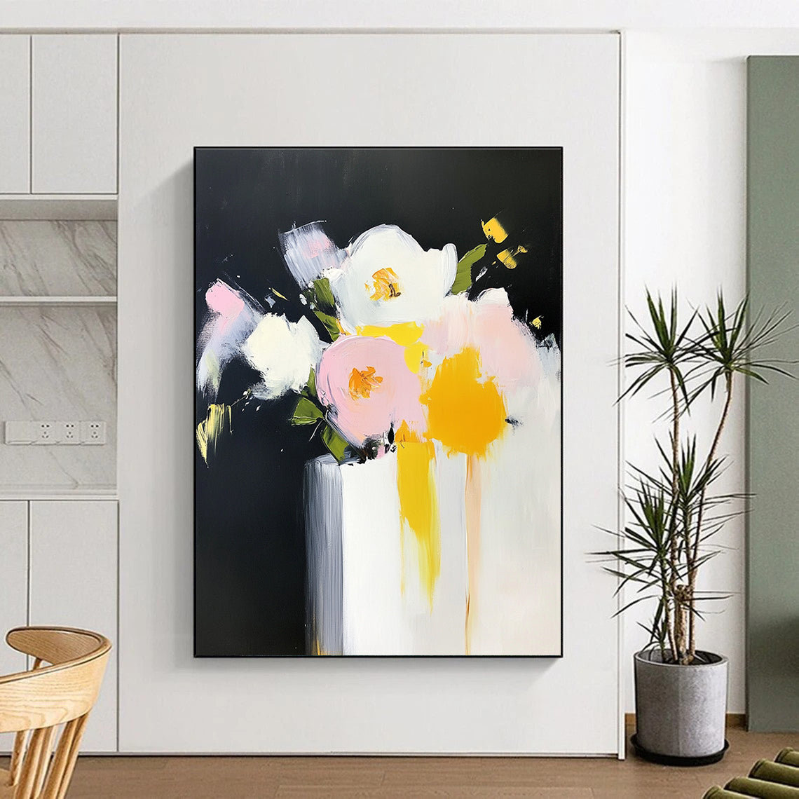 Large abstract oil painting of flowers in a vase with bold strokes in yellow and pink against a white background.STSC183