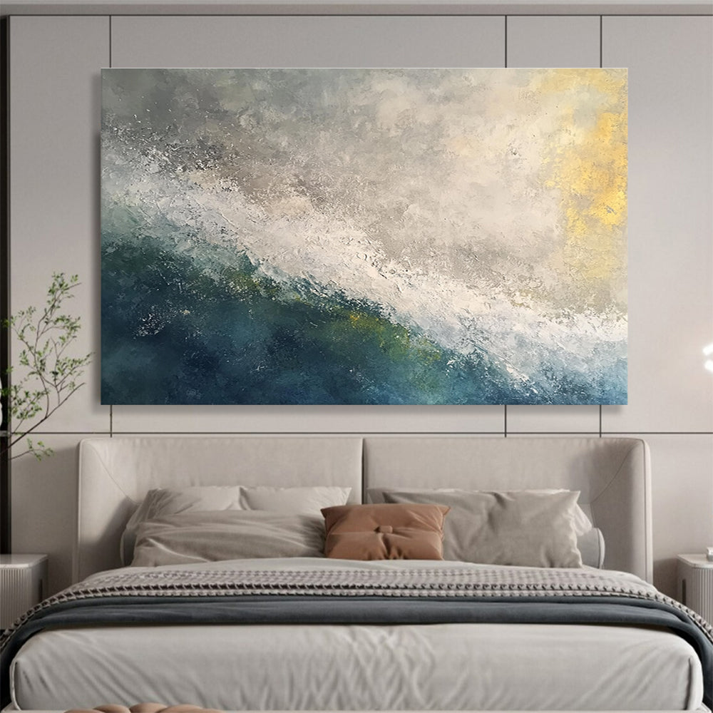 Large abstract oil painting of a stormy ocean at dawn featuring white and grey tones with touches of blue green and yellow.SC119