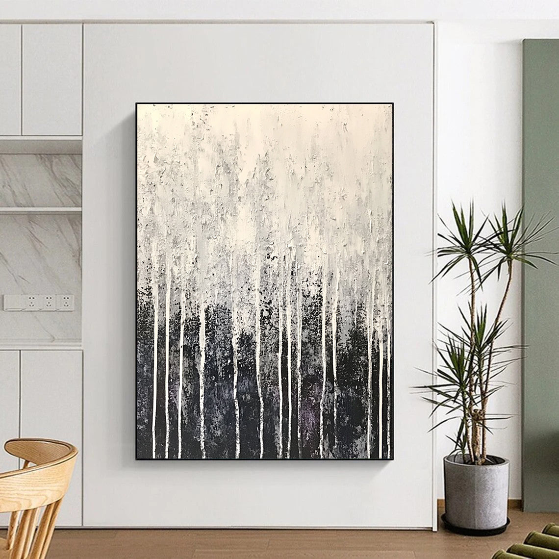 Large abstract painting in white and gray with drip effects and fine droplets resembling frost creating a serene winter atmosphere.STSC360