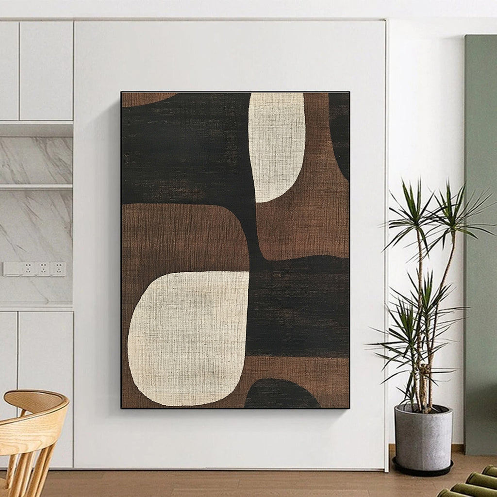 Abstract artwork featuring mid-century modern designs with simple shapes in neutral tones of black brown beige and white enhancing any space.STSC1320