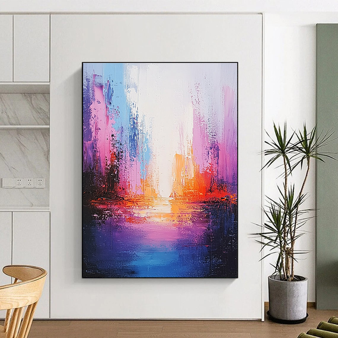Large abstract painting of an ocean in light purple and pink with a tall illuminated building creating a soothing ethereal atmosphere.STSC264