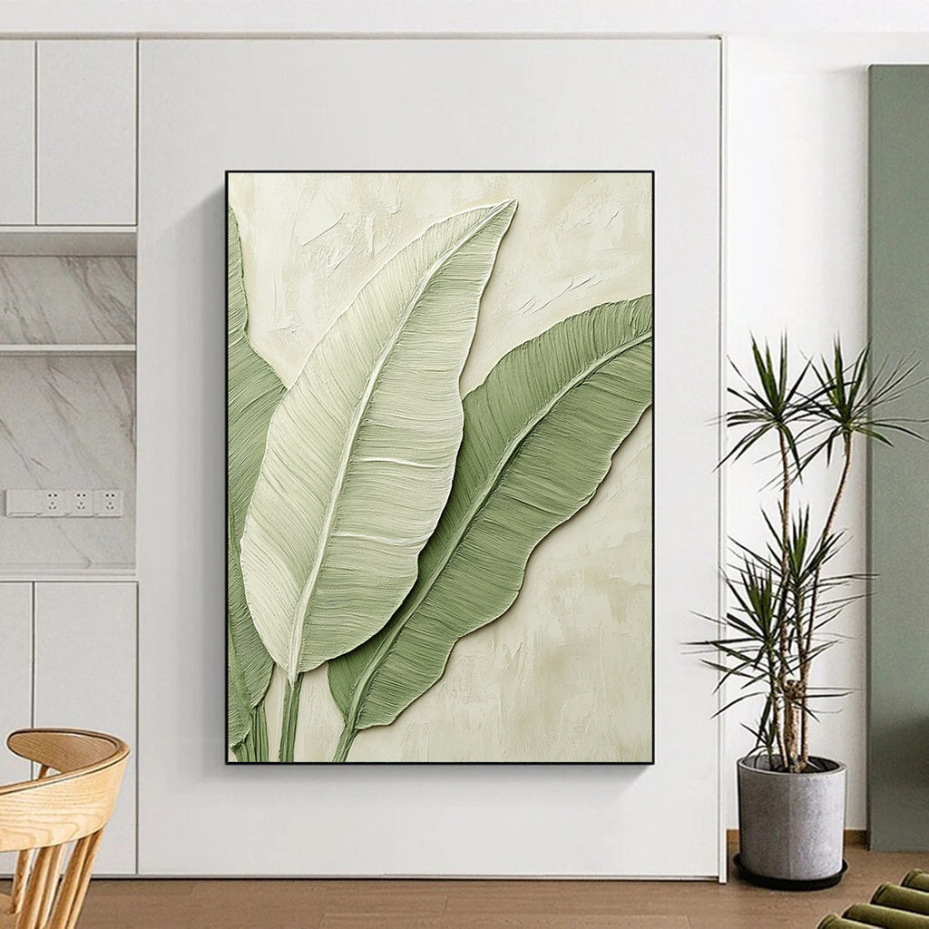 A large abstract painting of banana leaves in light green tones on a beige background, perfect for enhancing any modern space.STSC002