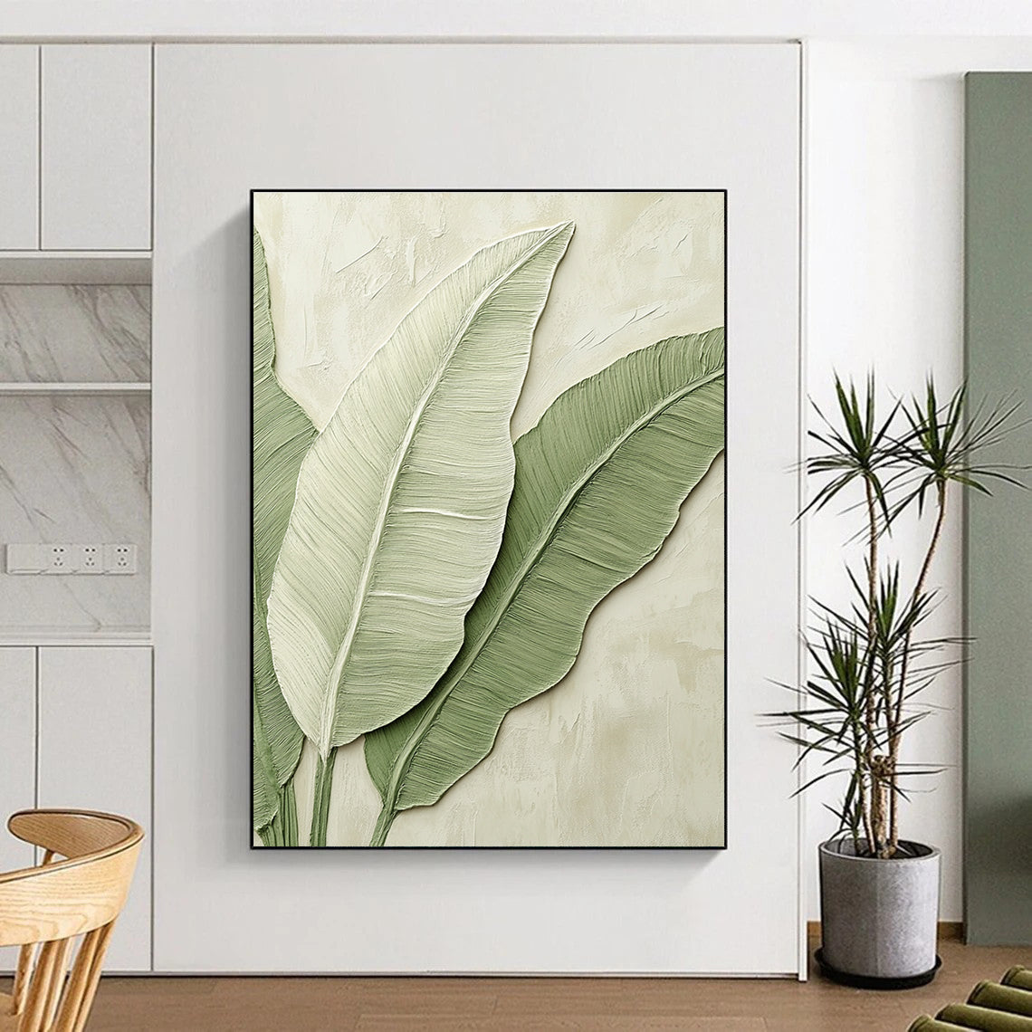 A large abstract painting of banana leaves in light green tones on a beige background, perfect for enhancing any modern space.STSC002