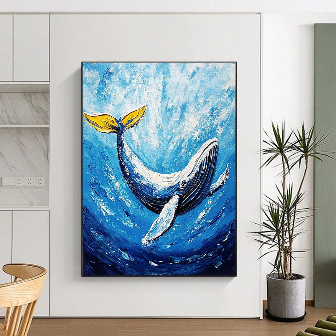A large abstract painting featuring a majestic whale gliding through deep blue waters in vibrant acrylic colors.STSC1052