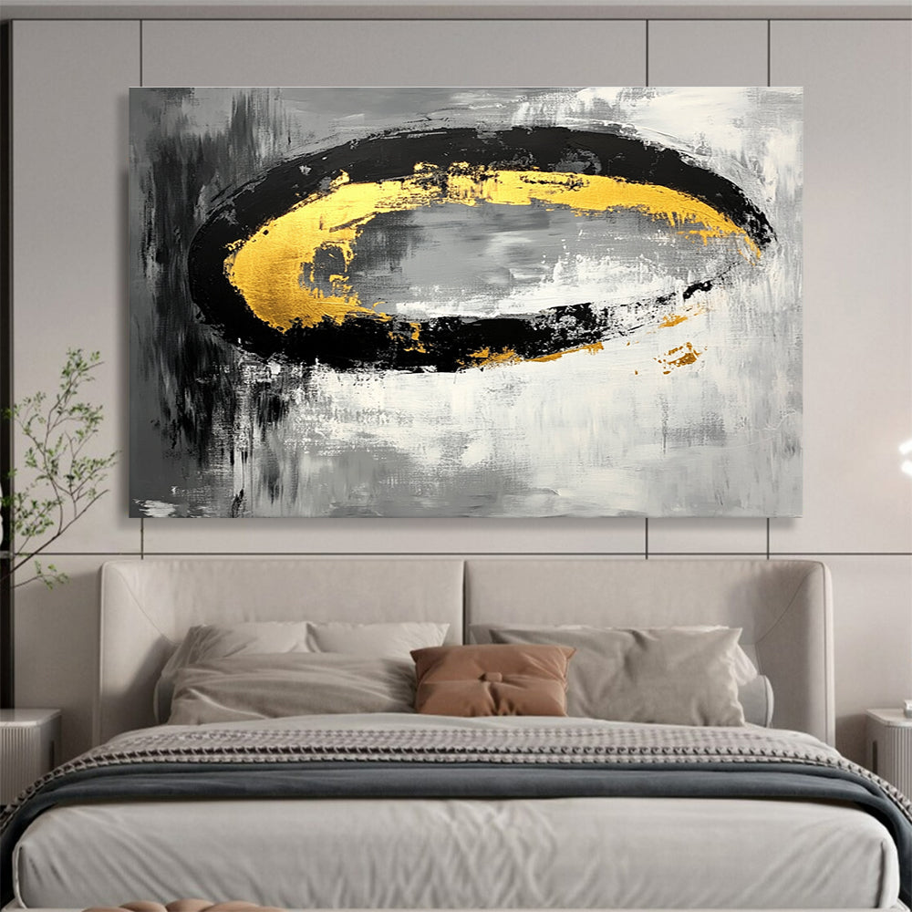 Large abstract painting featuring black white gray tones with gold accents and oval brush strokes on canvas.SC137