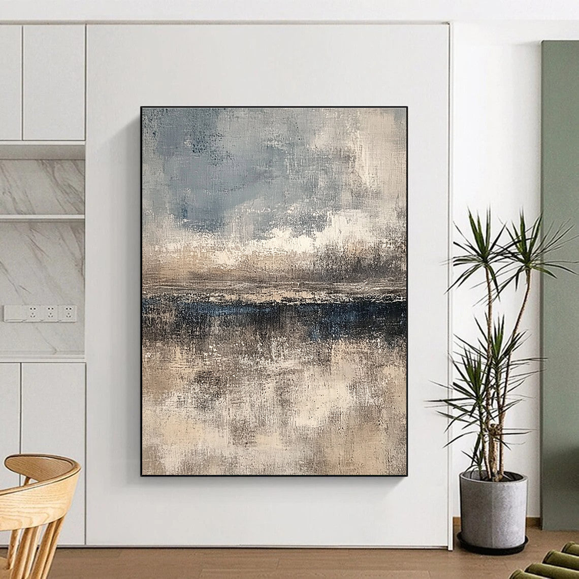 Large abstract painting featuring textured layers in neutral beige and gray with subtle blue and white accents creating depth and a serene horizon line.STSC108
