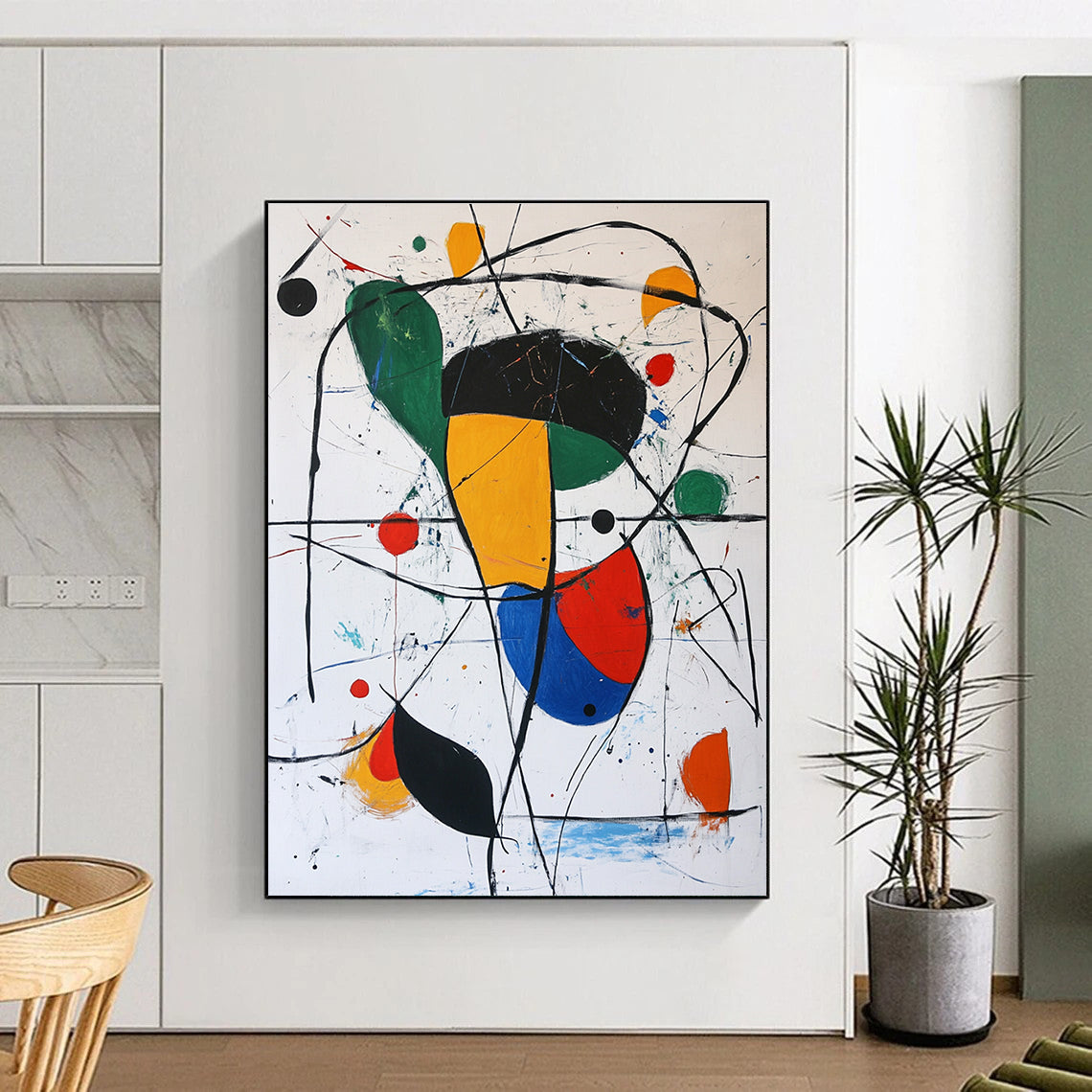 Large abstract painting featuring simple shapes and lines in black red green yellow and white with small colorful dots in a Joan Miro style.STSC377