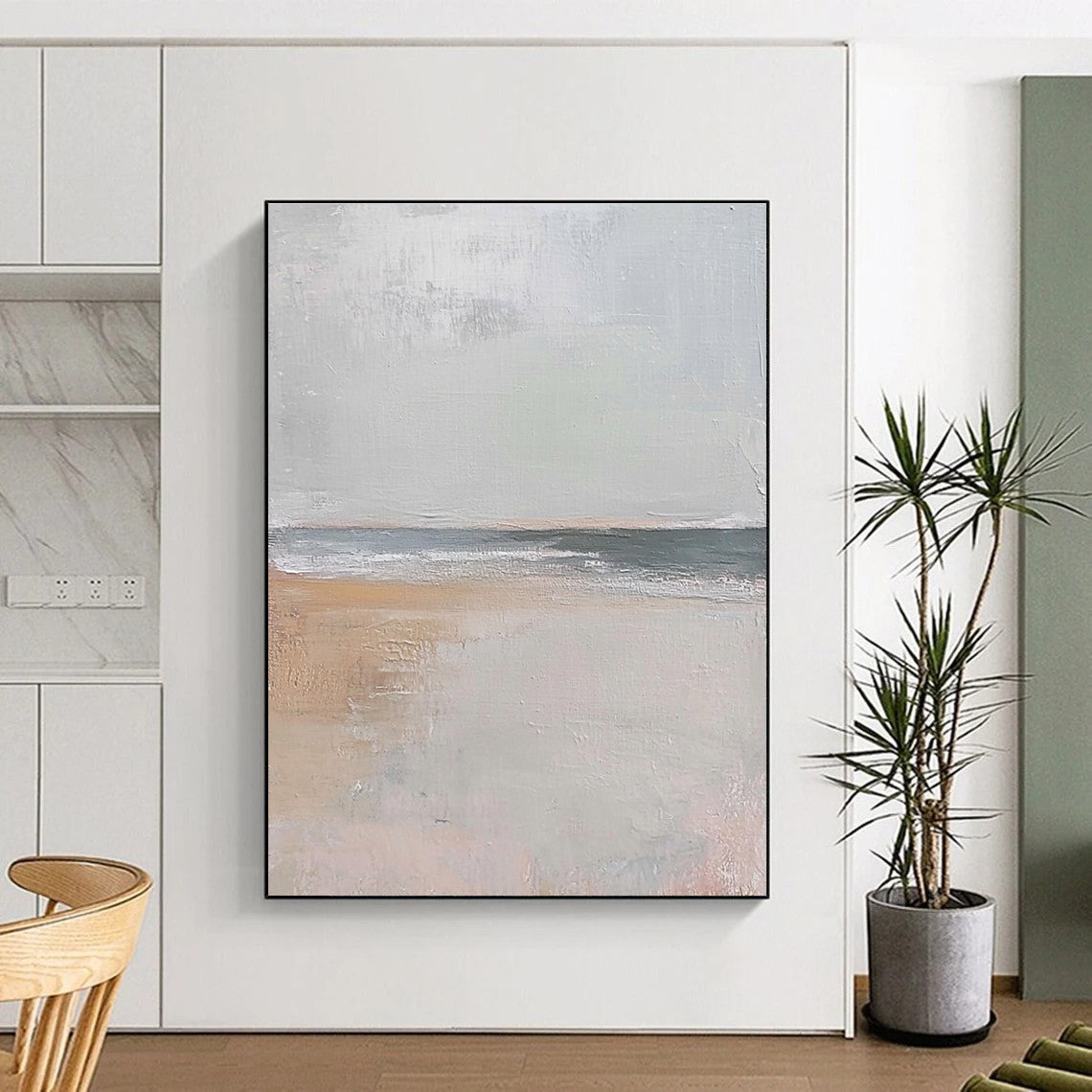Large abstract painting in muted beige and gray tones featuring gentle brushstrokes of serene coastal scenery with hints of sandy textures and flying seagulls.STSC016