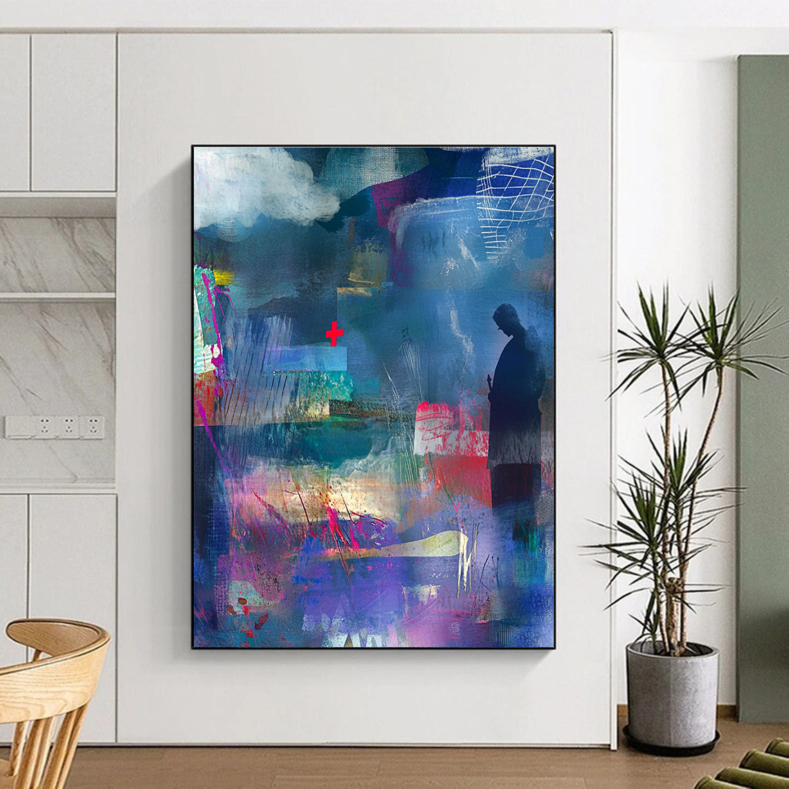 Large abstract collage with watercolor splashes and textured paper featuring a shadowy figure a red cross and vibrant ribbons in rich colors.STSC574
