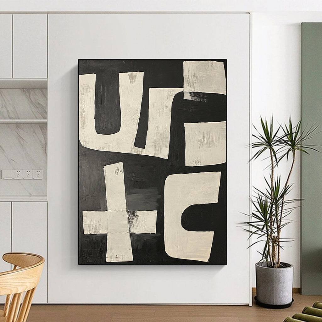 Large abstract painting featuring dynamic black and white shapes resembling the word use in a bold and energetic composition.STSC1133