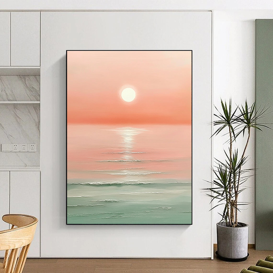 Large abstract painting featuring a pink sunset over the ocean with a white sun and soft muted colors.STSC1424