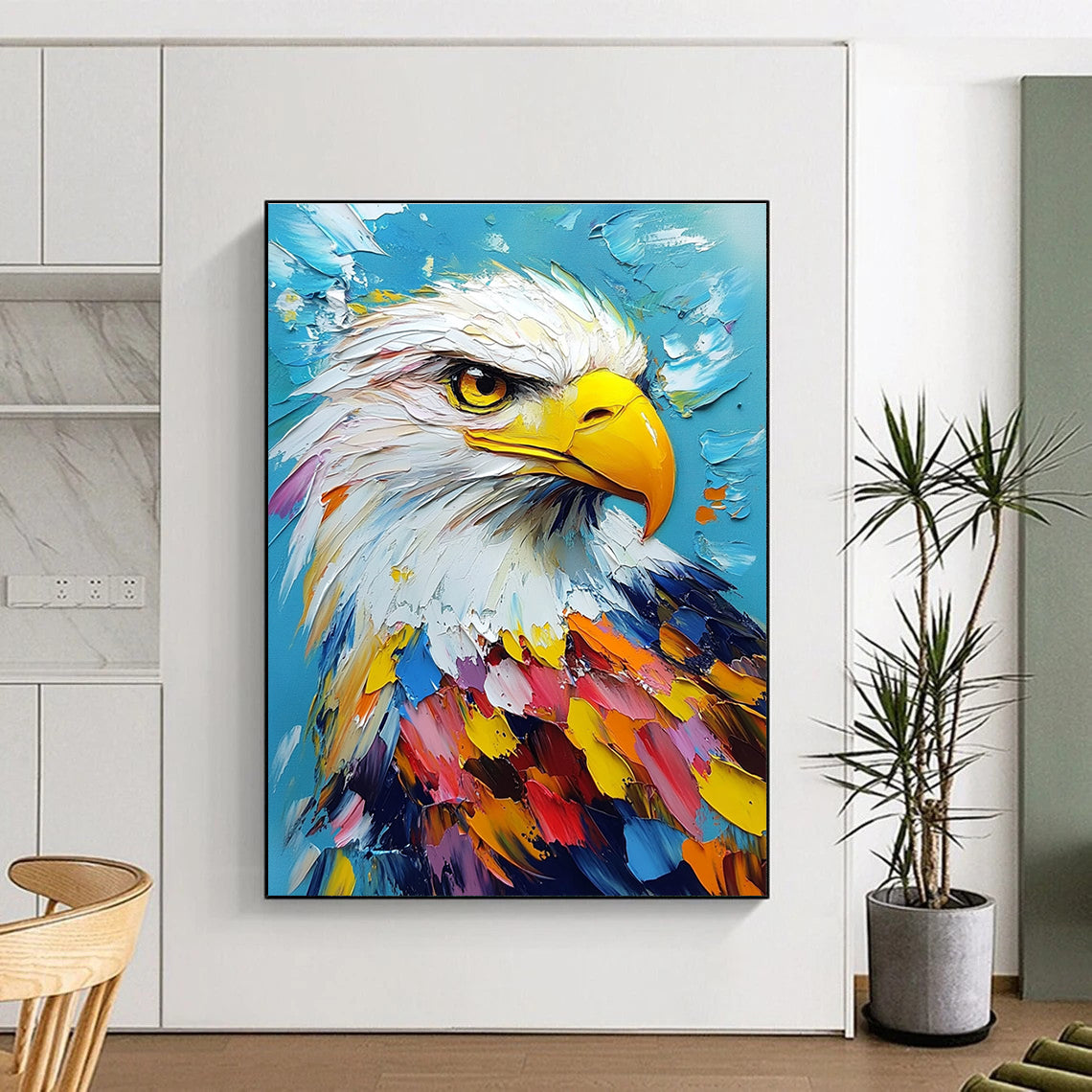 Large abstract painting featuring a colorful bald eagle portrait on a vibrant blue background, created with impasto oil techniques on canvas.STSC1285