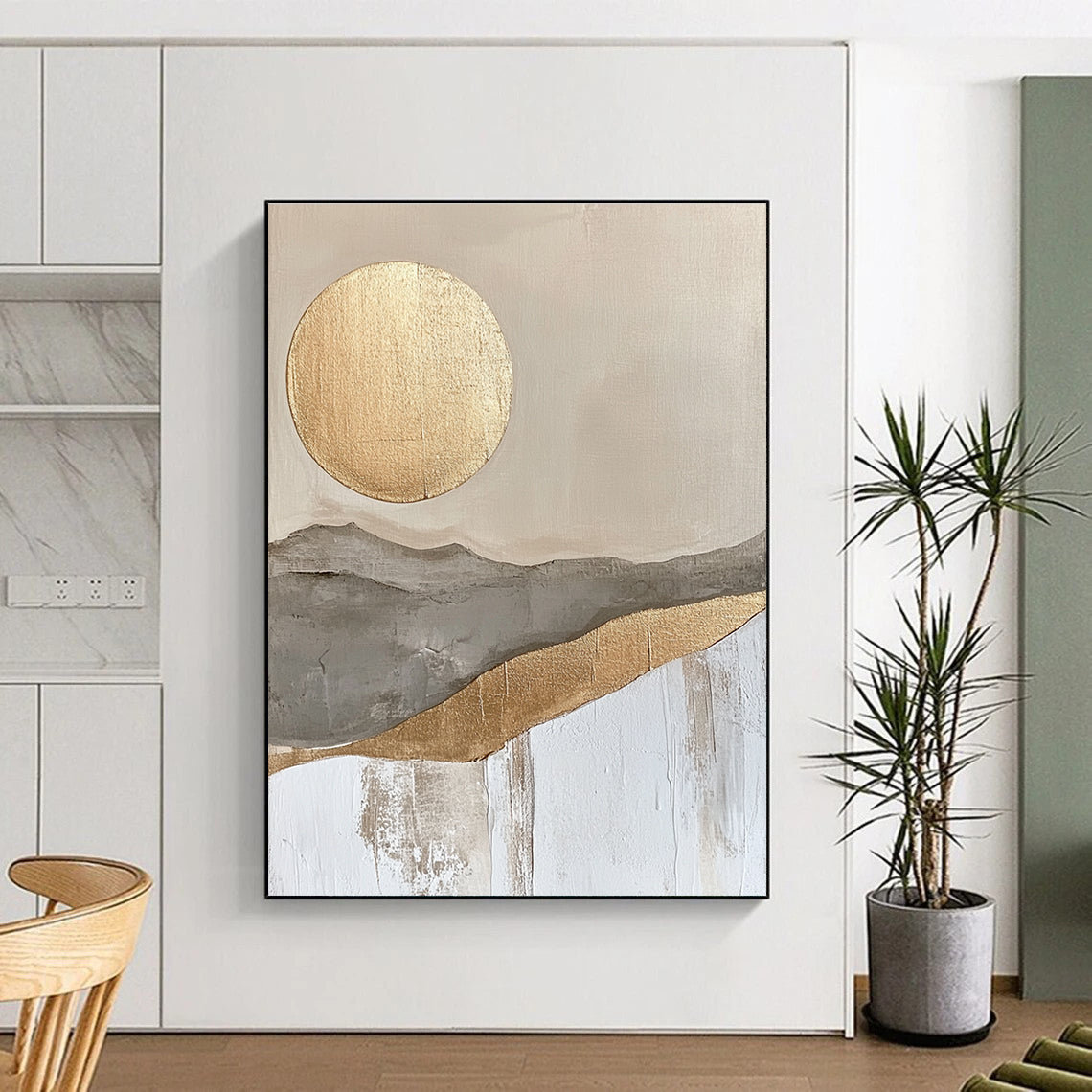 Large abstract painting featuring a golden sun and moon in a soft gray beige and white landscape with textured gold accents.STSC126