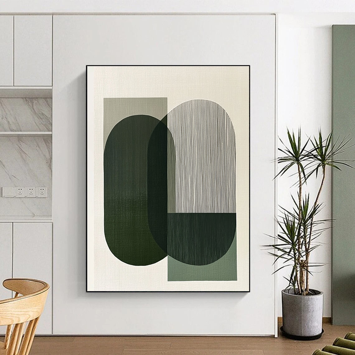 A large abstract painting features overlapping green and gray shapes evoking calmness and balance through minimalist design and clean lines.STSC1178
