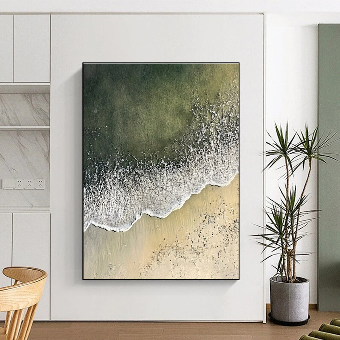 Abstract painting depicting a serene coastal scene with gentle waves and soft sandy textures, blending white and gray with distant green sea hues.STSC1431
