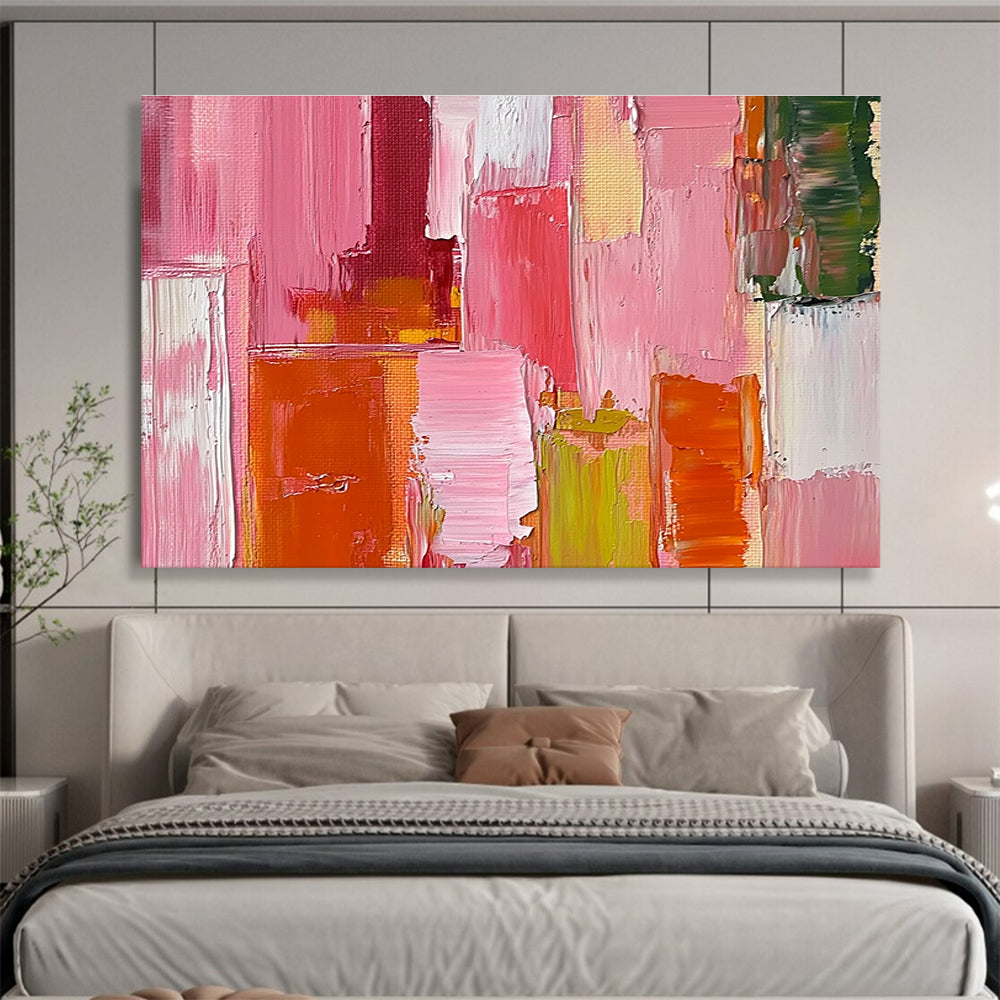 Large abstract oil painting featuring a pink orange and red cityscape with thick brush strokes and a soft impressionist style.SC118