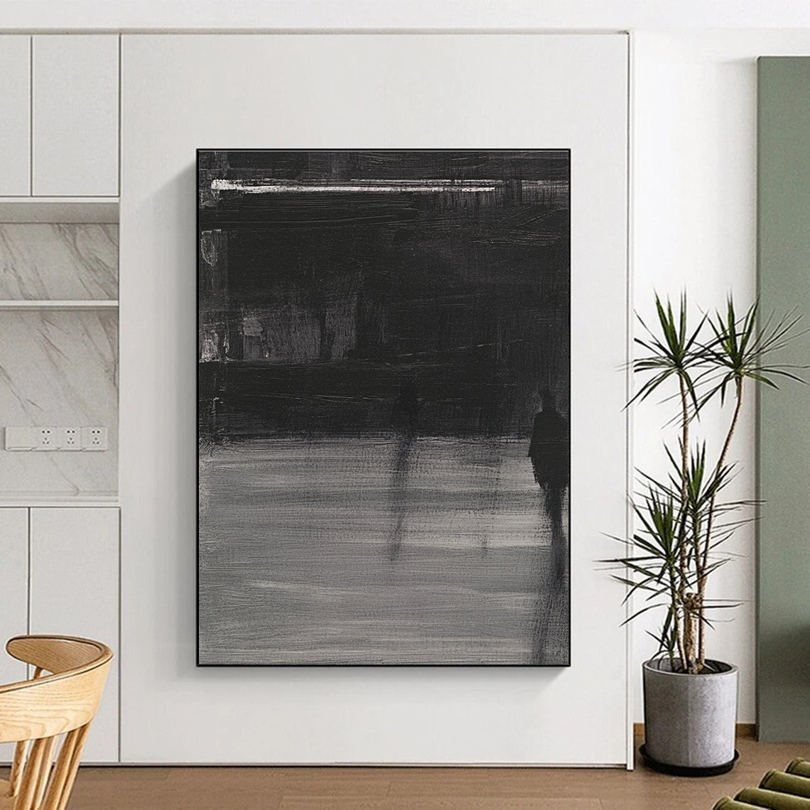Large abstract painting featuring deep gray tones bold brushstrokes and a mysterious atmosphere with soft lighting and striking light shadow contrasts.STSC910