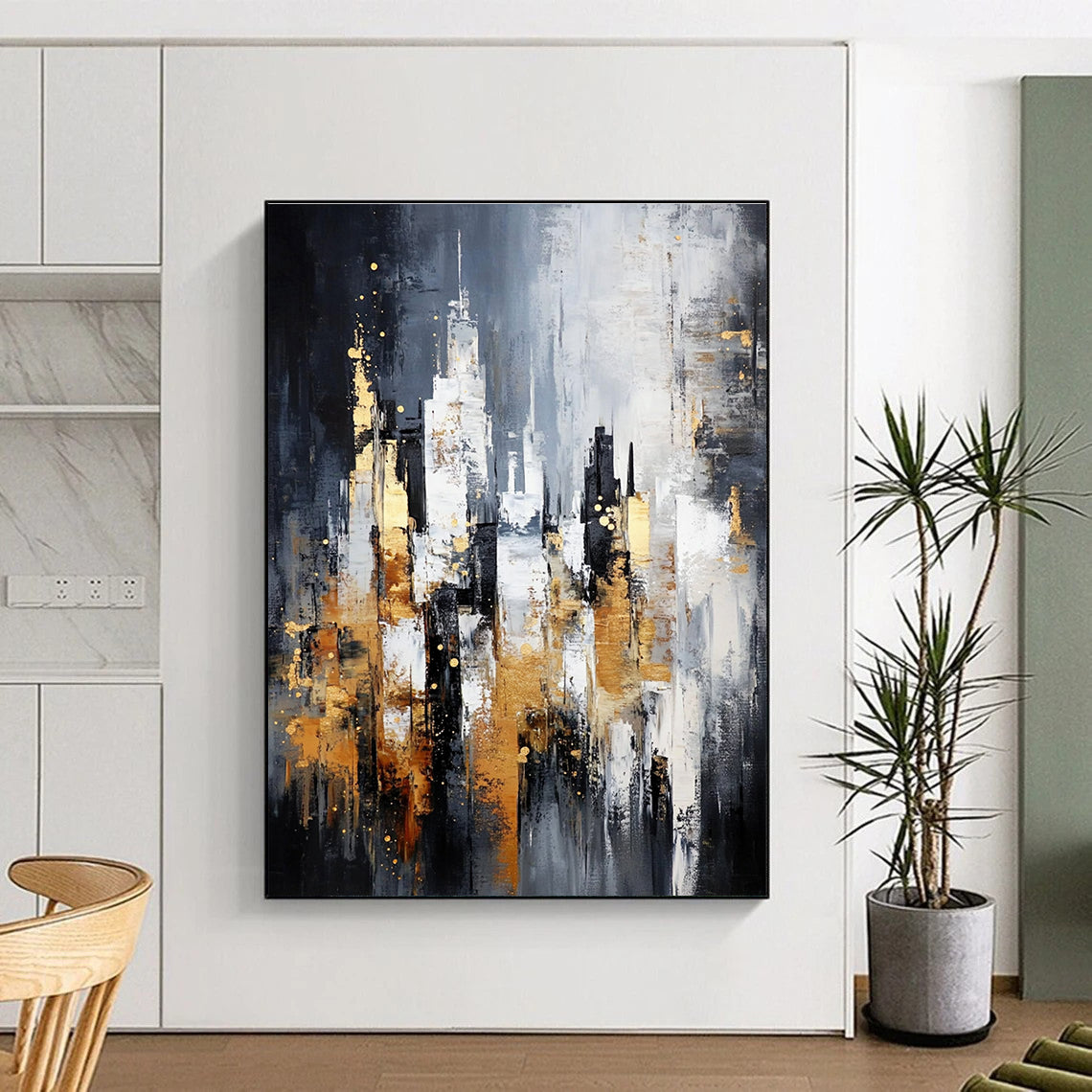 Large abstract painting of a cityscape in gray and white with gold accents on a dark background featuring neutral tones.STSC282