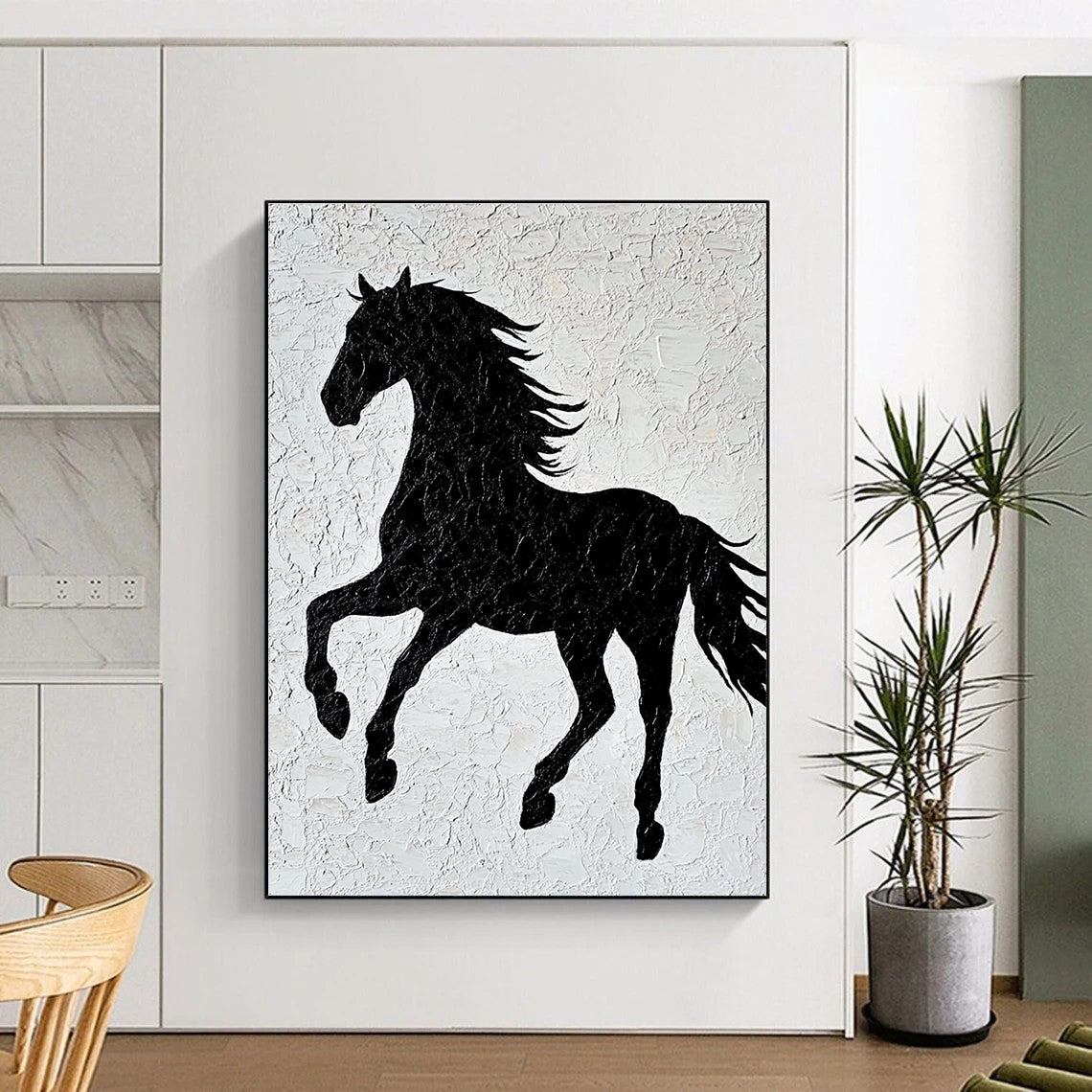A large abstract artwork featuring a black horse silhouette on textured white paper with elegant lines and a minimalist design capturing graceful movement.STSC917