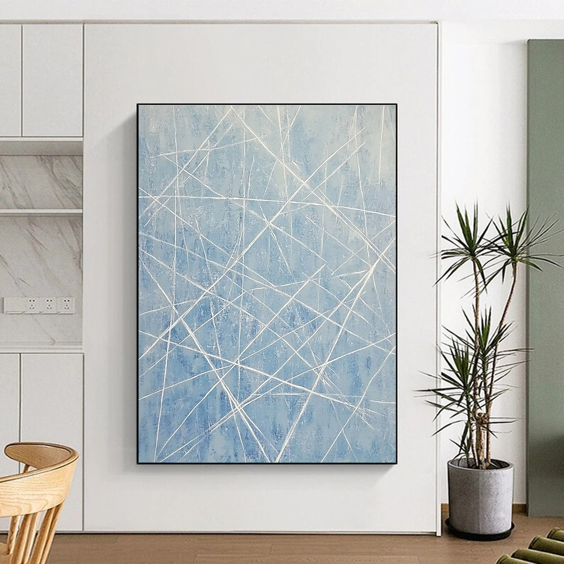 Large abstract painting of light blue and white lines resembling an icy landscape with vertical lines and frozen icicle-like formations.STSC316