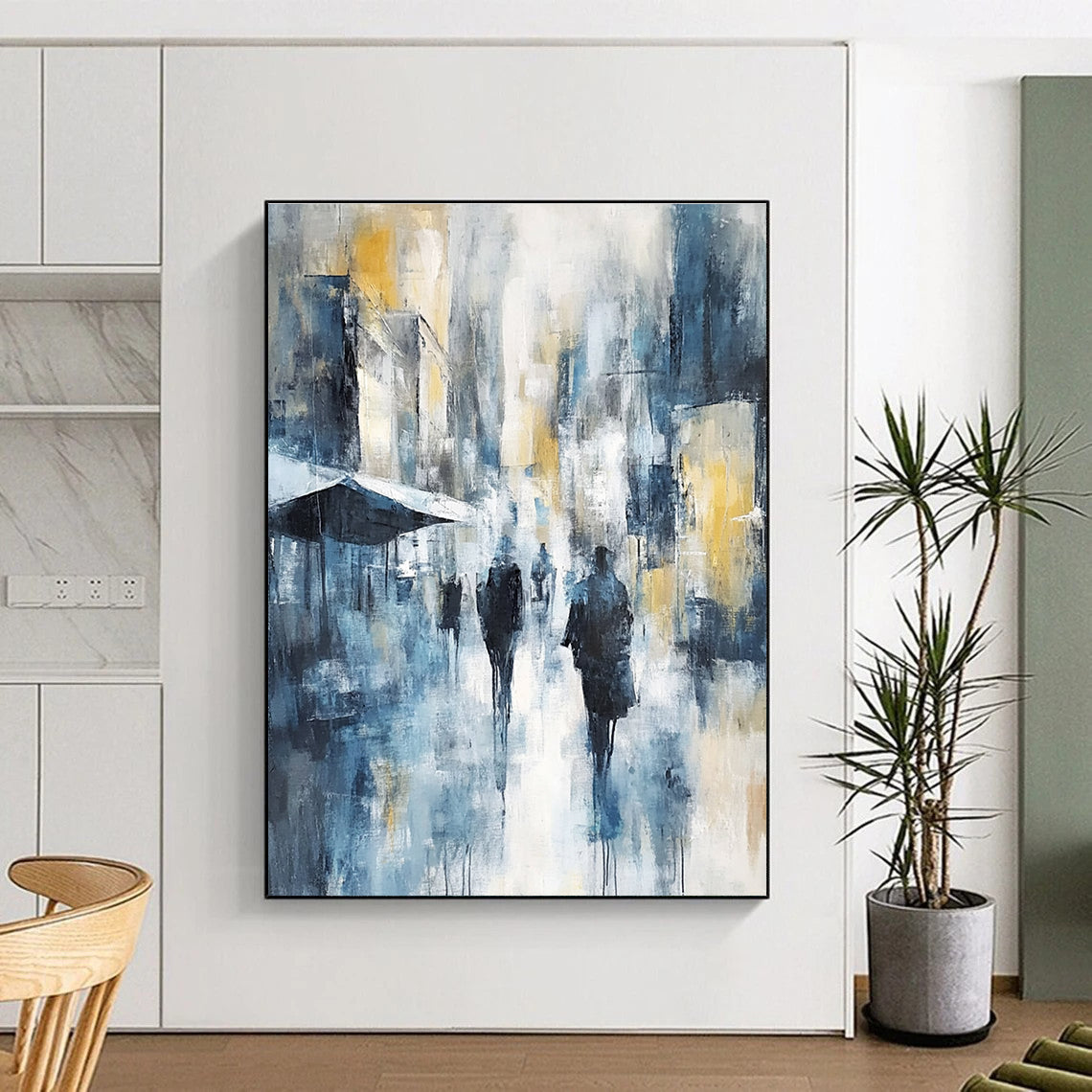 Large abstract painting of an urban cityscape in cool blue tones with hints of yellow and gray showcasing soft brushstrokes and impressionist influence.STSC277