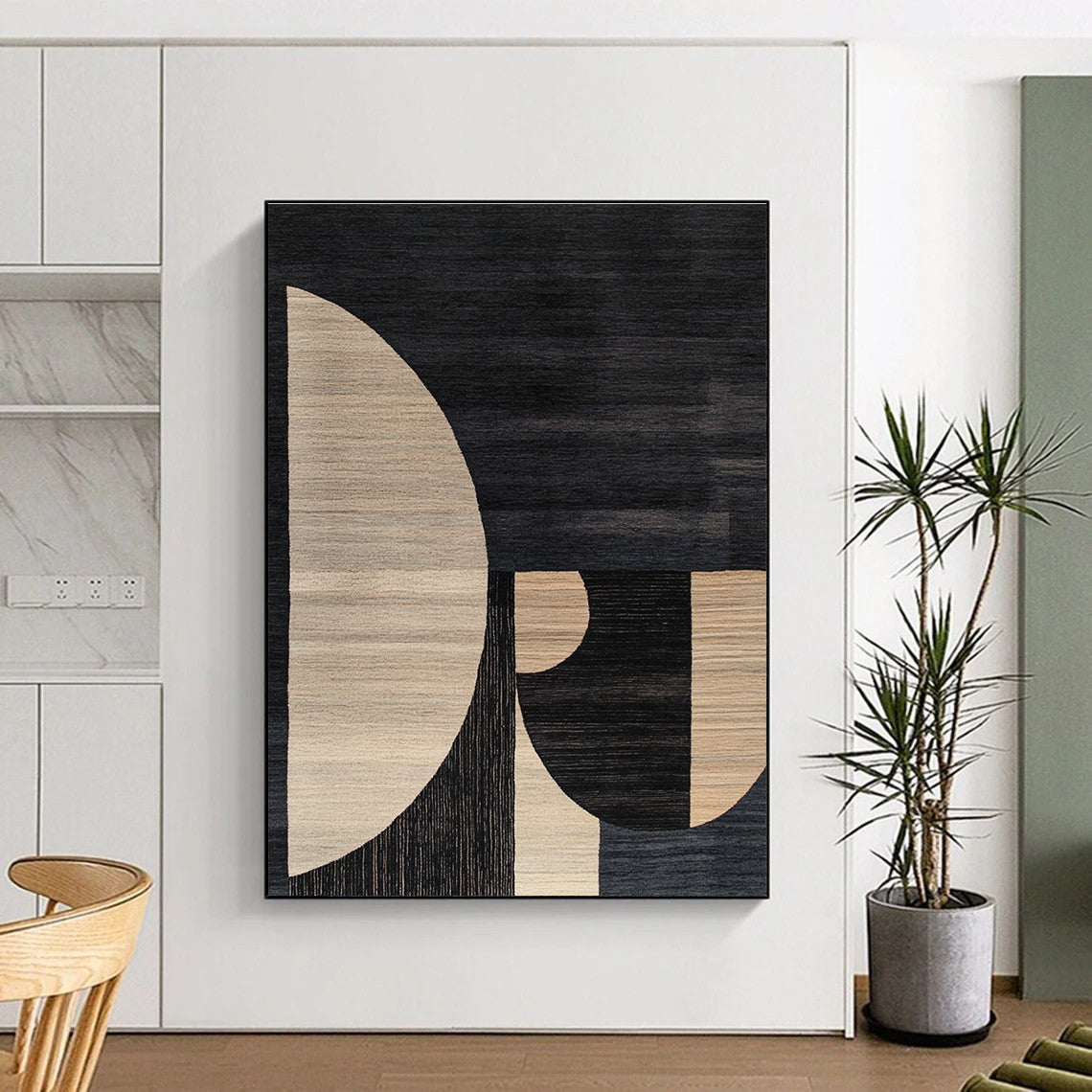 Large abstract rug featuring a minimalistic Bauhaus design with soft edges contrasting dark gray beige black and white tones.STSC1169