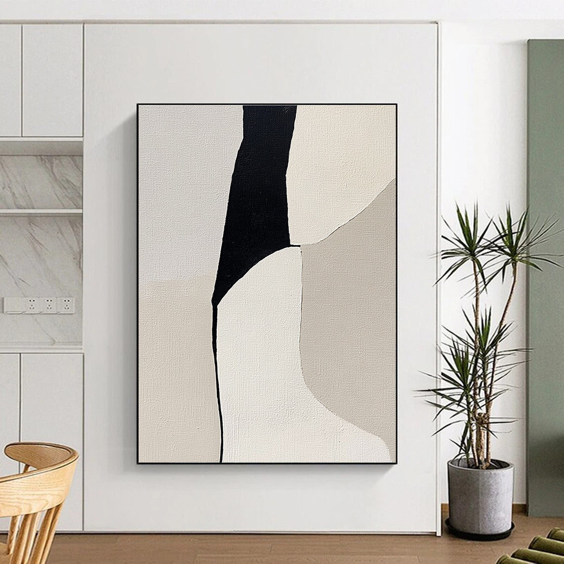 Abstract painting featuring a woman's form in shades of gray and beige on light gray canvas highlighting minimalism and depth through negative space.STSC792