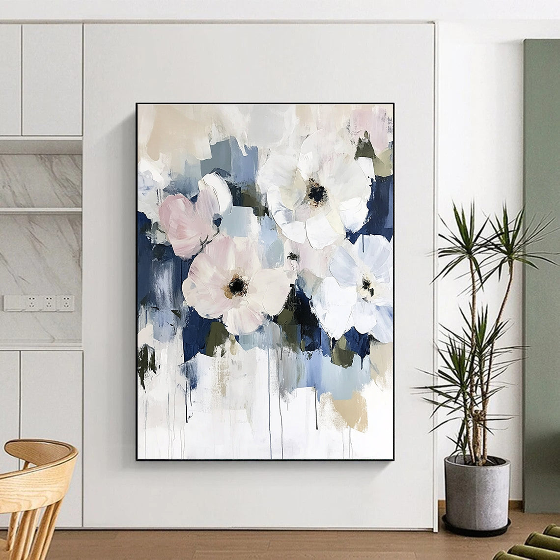 Large abstract floral painting in soft pinks and whites with hints of blue featuring minimalist style and soft brushstrokes on neutral tones.STSC056