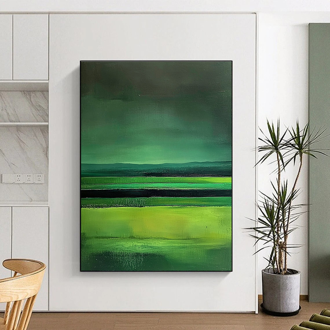 Large abstract painting featuring green fields dark sky and lake in a minimalist style with fluid lines inspired by Mark Rothko.STSC309