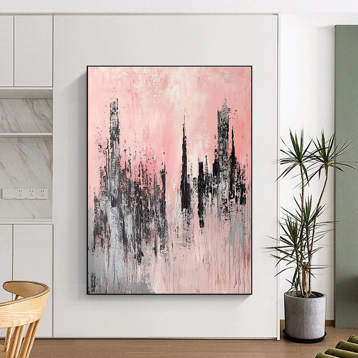 Large abstract painting of skyscrapers featuring light pink and grey colors with soft brush strokes in a modern urban landscape style.STSC331