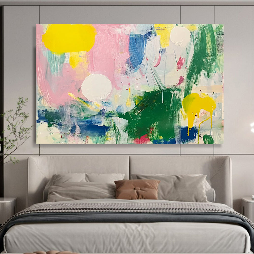 Large abstract painting featuring bright colors with green and pink shapes white circles yellow lines blue lines and light red elements on a white background.SC231