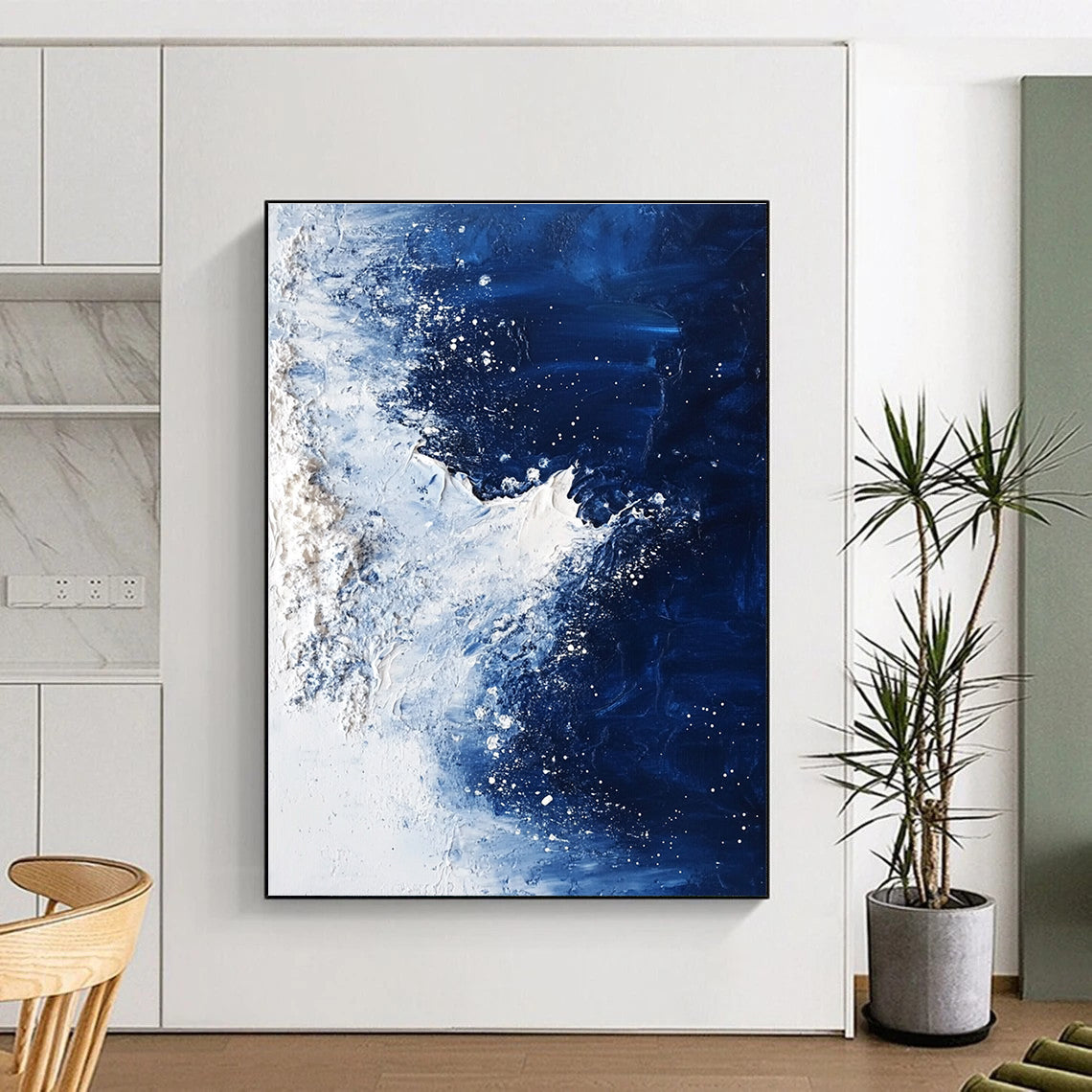 Large abstract painting depicting the North Pole with deep blue water ice and dynamic white brush strokes.STSC341