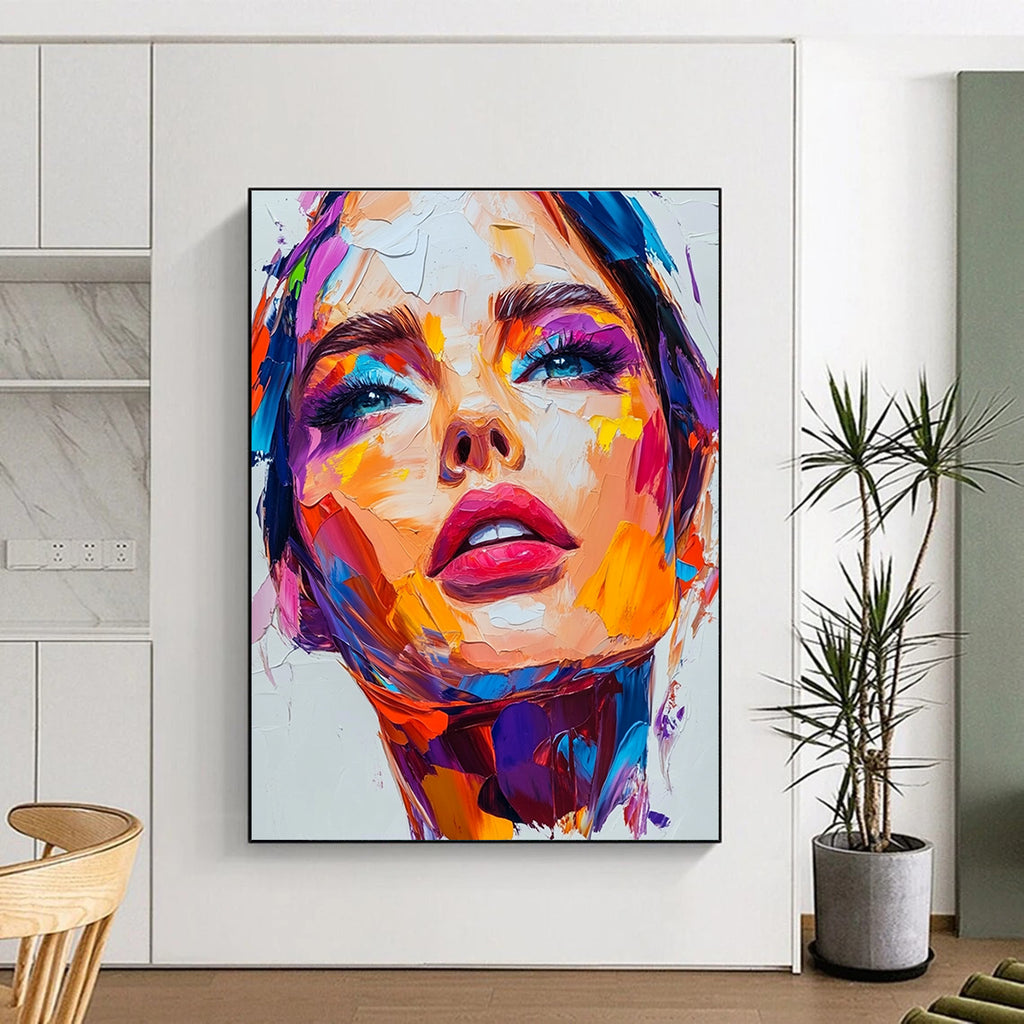 An abstract painting featuring a close-up portrait of an attractive woman with vibrant colors and thick brush strokes on a white background.STSC1162