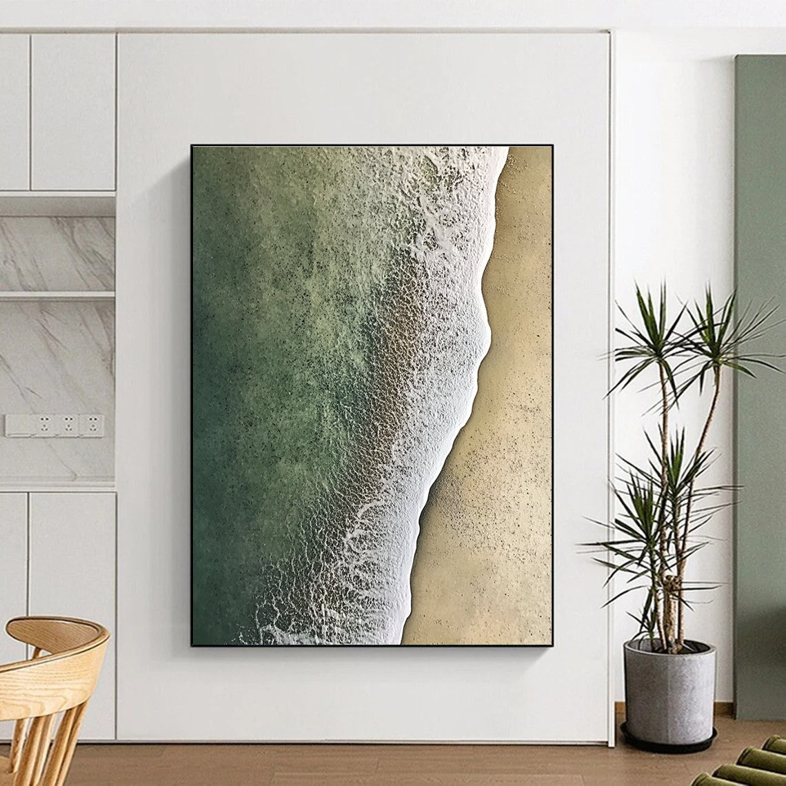 Large abstract painting of soft textured sand meeting green and white water from an aerial view, evoking serenity and natural beauty.STSC1159